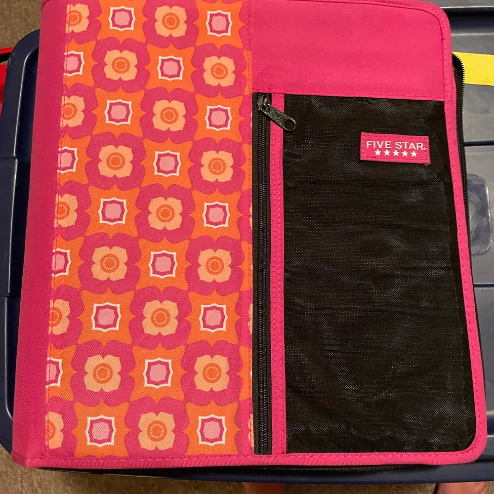 Binder with zipper storage
